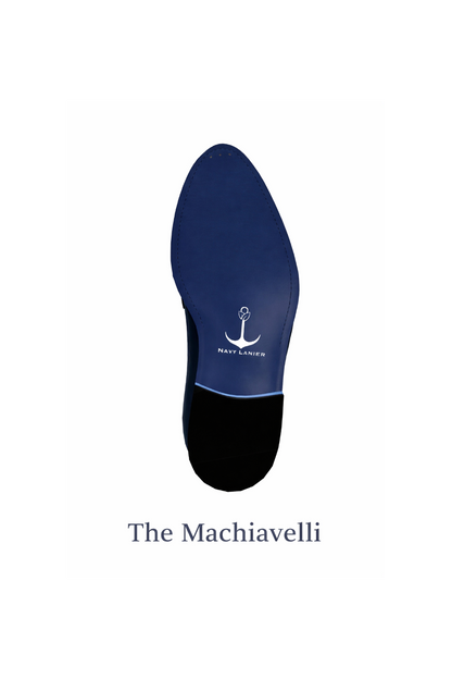 Navy Lanier's blue loafer with a silver buckle on a white background, branded 'The Machiavelli'.